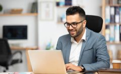 Portrait of a handsome young businessman working in office